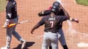 Gamecocks catcher Dalton Reeves (44) celebrates his two-run homer with Gamecocks outfielder Kennedy Jones (7) in the top of the ninth inning against Florida. The Gators beat South Carolina 11-9 at Condron Family Ballpark in Gainesville, Florida, Sunday, April 14, 2024.