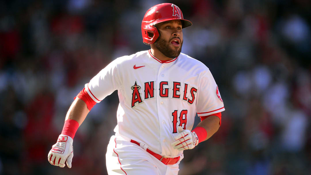 Sep 19, 2021; Anaheim, California, USA; Los Angeles Angels right fielder Jose Rojas (18) runs after hitting a single agianst the Oakland Athletics during the ninth inning at Angel Stadium. Mandatory Credit: Gary A. Vasquez-Imagn Images