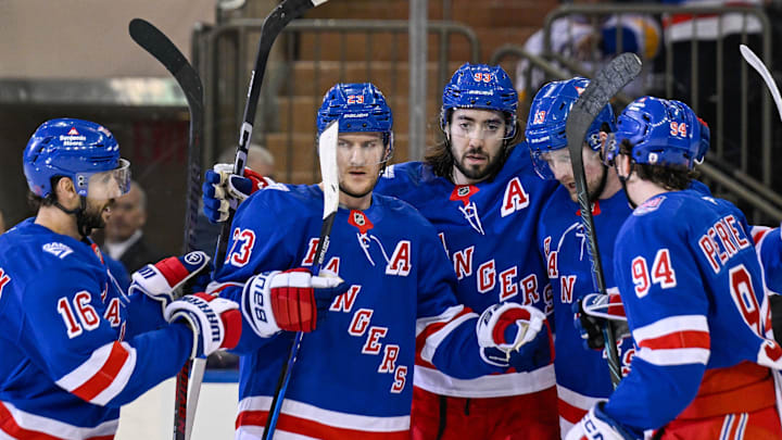 Mar 10, 2026; New York, New York, USA; New York Rangers center Vincent Trocheck (16), New York Rangers defenseman Adam Fox (23), New York Rangers center Mika Zibanejad (93) and New York Rangers right wing Gabe Perreault (94) celebrate the power play goal by New York Rangers left wing Alexis Lafrenière (13) against the Calgary Flames during the first period at Madison Square Garden. Mar 10, 2026; New York, New York, USA; New York Rangers center Vincent Trocheck (16), New York Rangers defenseman Adam Fox (23), New York Rangers center Mika Zibanejad (93) and New York Rangers right wing Gabe Perreault (94) celebrate the power play goal by New York Rangers left wing Alexis Lafrenière (13) against the Calgary Flames during the first period at Madison Square Garden.