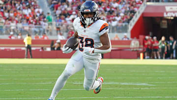 Aug 9, 2025; Santa Clara, California, USA;  Denver Broncos running back Jaleel McLaughlin (38) rushes the ball in the second quarter against the San Francisco 49ers at Levi's Stadium. Mandatory Credit: David Gonzales-Imagn Images