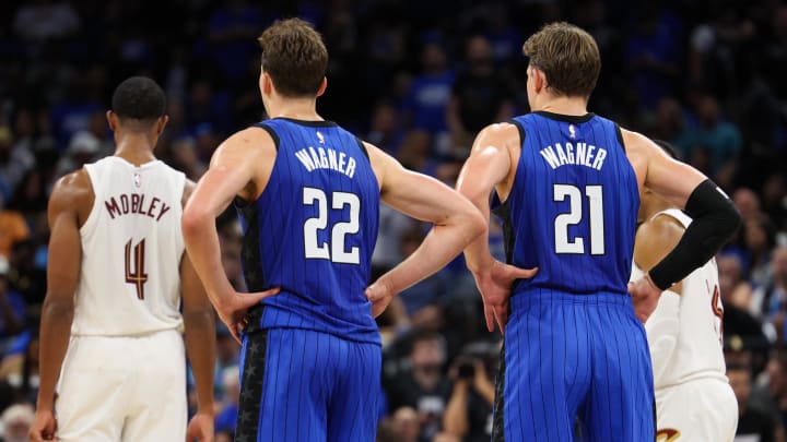 Orlando Magic center Moritz Wagner (21) and forward Franz Wagner (22) look on in a time out against the Cleveland Cavaliers in the fourth quarter during game four of the first round for the 2024 NBA playoffs at Kia Center. 