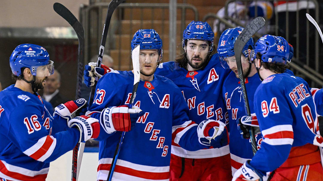 Mar 10, 2026; New York, New York, USA;  New York Rangers center Vincent Trocheck (16), New York Rangers defenseman Adam Fox (23), New York Rangers center Mika Zibanejad (93) and New York Rangers right wing Gabe Perreault (94) celebrate the power play goal by New York Rangers left wing Alexis Lafrenière (13) against the Calgary Flames during the first period at Madison Square Garden. 