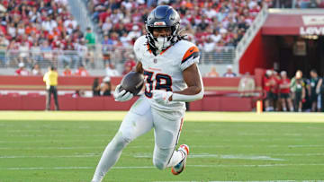 Aug 9, 2025; Santa Clara, California, USA;  Denver Broncos running back Jaleel McLaughlin (38) rushes the ball in the second quarter against the San Francisco 49ers at Levi's Stadium. Mandatory Credit: David Gonzales-Imagn Images