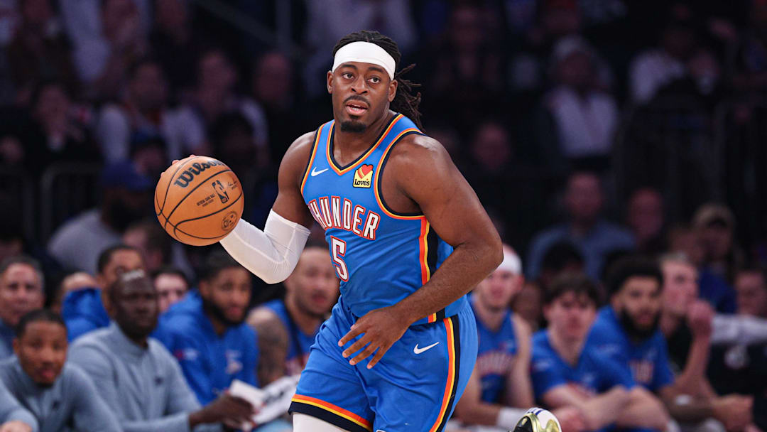 Mar 4, 2026; New York, New York, USA; Oklahoma City Thunder guard Luguentz Dort (5) dribbles up court against the New York Knicks during the first half at Madison Square Garden. Mandatory Credit: Vincent Carchietta-Imagn Images