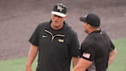 Wake Forest baseball coach Tom Walter talks to the umpire at the NCAA college baseball Knoxville Regional final againstTennessee on June 1, 2025, in Knoxville, Tenn.