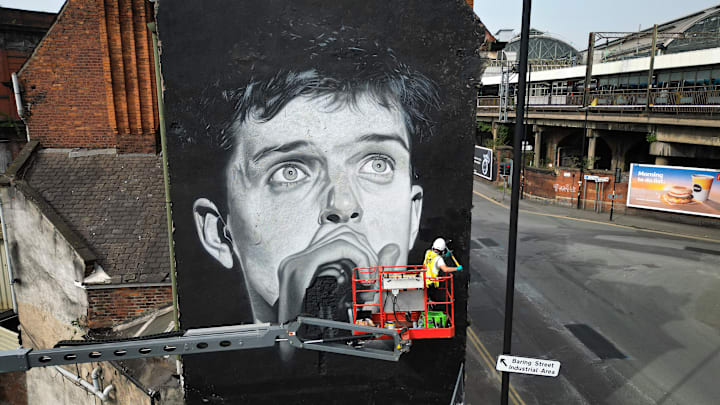Restored Ian Curtis Mural Unveiled In Manchester