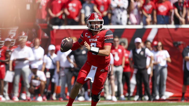 Sep 7, 2024; Salt Lake City, Utah, USA; Utah Utes quarterback Cameron Rising (7) looks to pass the ball against the Baylor Bears during the first quarter at Rice-Eccles Stadium. Mandatory Credit: Rob Gray-Imagn Images