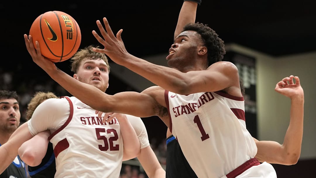 Feb 28, 2026; Stanford, California, USA; Stanford Cardinal guard Ebuka Okorie (1) shoots against the Southern Methodist University Mustangs during the first half at Maples Pavilion. Mandatory Credit: Darren Yamashita-Imagn Images
