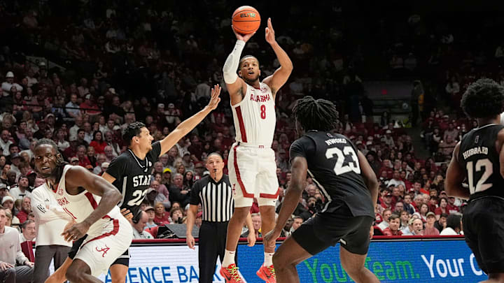 Feb 25, 2025; Tuscaloosa, AL, USA; Alabama guard Chris Youngblood (8) shoots a three and is defended by Mississippi State forward RJ Melendez (22) at Coleman Coliseum. Mandatory Credit: Gary Cosby Jr.-Tuscaloosa News