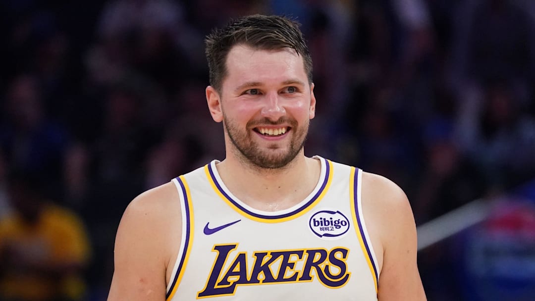 Feb 28, 2026; San Francisco, California, USA;  Los Angeles Lakers forward/guard Luka Doncic (77) smiles during a break in the action against the Golden State Warriors in the third period at Chase Center. Mandatory Credit: David Gonzales-Imagn Images