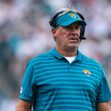 Sep 15, 2024; Jacksonville, Florida, USA; Jacksonville Jaguars head coach Doug Pederson talks with an official in the second quarter against the Cleveland Browns at EverBank Stadium. Mandatory Credit: Jeremy Reper-Imagn Images