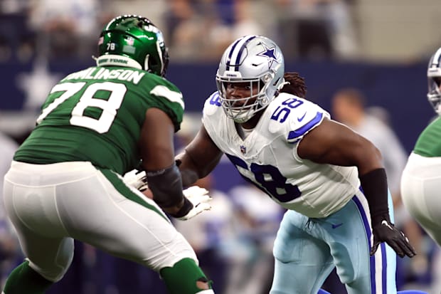 Dallas Cowboys defensive tackle Mazi Smith rushes the passer while blocked by New York Jets guard Laken Tomlinson