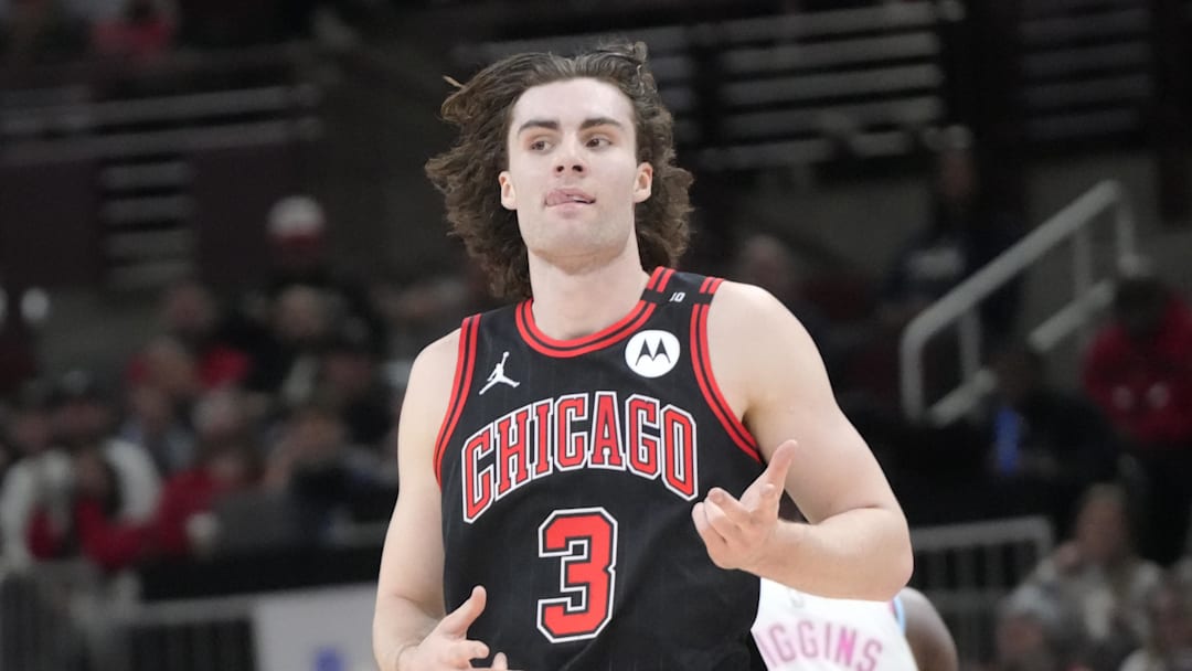 Apr 9, 2025; Chicago, Illinois, USA; Chicago Bulls guard Josh Giddey (3) gestures after making a three point basket against the Miami Heat during the second half at United Center. Mandatory Credit: David Banks-Imagn Images