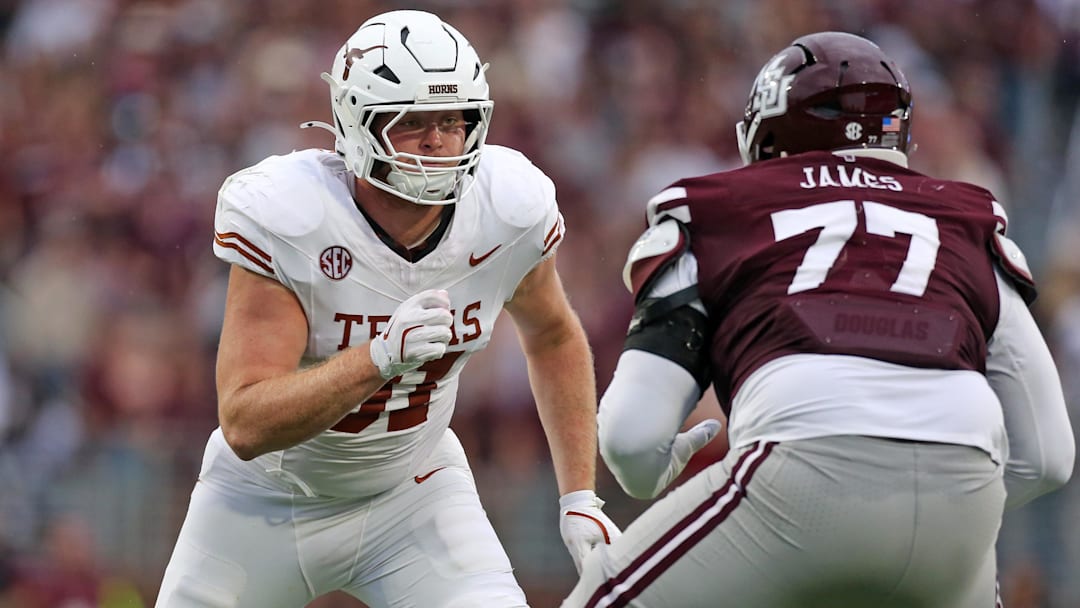 Oct 25, 2025; Starkville, Mississippi, USA; Texas Longhorns defensive linemen Ethan Burke (91) attempts to get into the backfield during the second quarter against the Mississippi State Bulldogs at Davis Wade Stadium at Scott Field. Mandatory Credit: Petre Thomas-Imagn Images