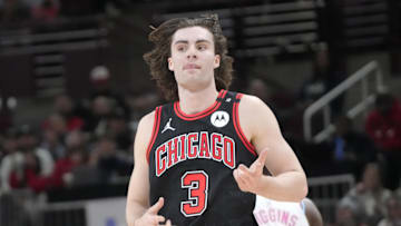 Apr 9, 2025; Chicago, Illinois, USA; Chicago Bulls guard Josh Giddey (3) reacts after making a three point basket against the Miami Heat during the second half at United Center. Mandatory Credit: David Banks-Imagn Images