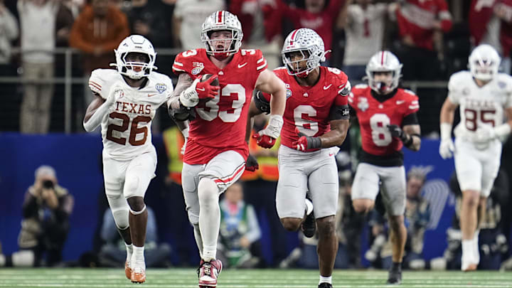 Ohio State Buckeyes' Jack Sawyer returns a fumble for a touchdown during the Cotton Bowl Classic College Football Playoff Ohio State Buckeyes' Jack Sawyer returns a fumble for a touchdown during the Cotton Bowl Classic College Football Playoff
