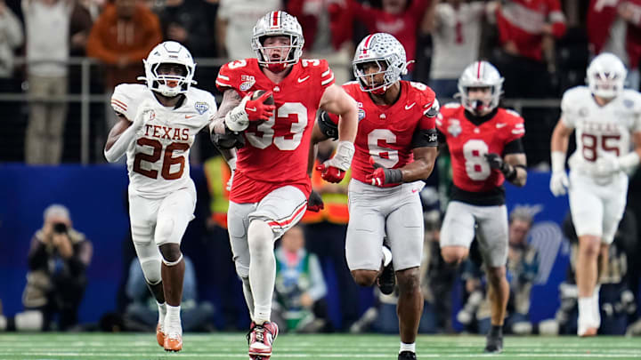 Ohio State defensive end Jack Sawyer (33) returns a fumble recovery for a touchdown against Texas during the 2025 Cotton Bowl at AT&T Stadium in Arlington, Texas.