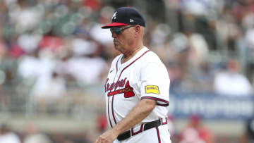 Aug 4, 2024; Cumberland, Georgia, USA; Atlanta Braves manager Brian Snitker (43) walks off the mound in a game against the Miami Marlins in the forth inning at Truist Park. Mandatory Credit: Mady Mertens-USA TODAY Sports