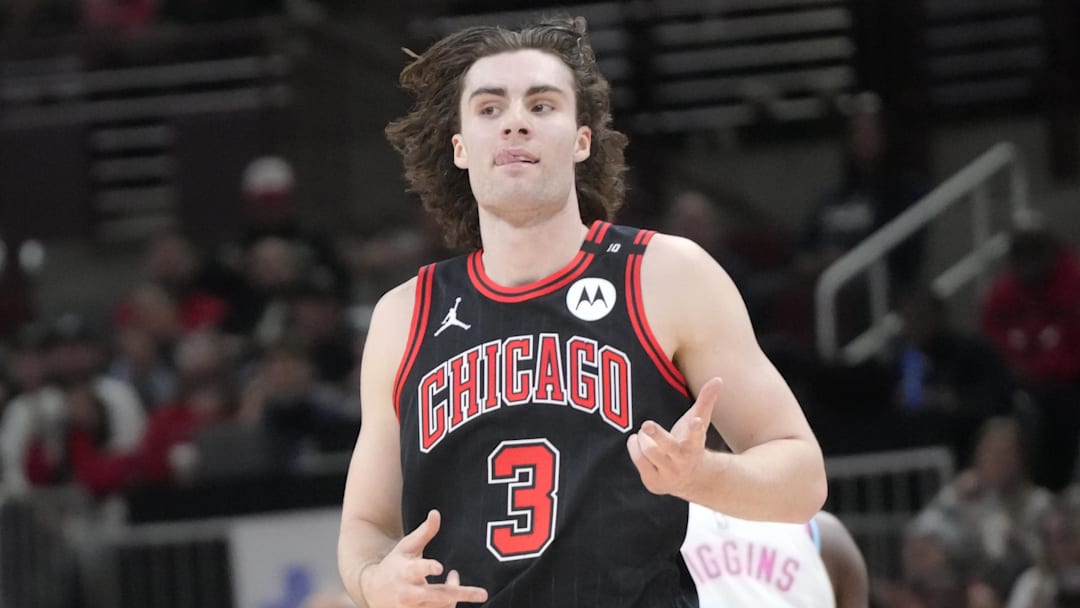 Apr 9, 2025; Chicago, Illinois, USA; Chicago Bulls guard Josh Giddey (3) reacts after making a three point basket against the Miami Heat during the second half at United Center. Mandatory Credit: David Banks-Imagn Images