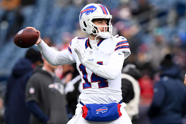 Buffalo Bills quarterback Mike White throws the ball before a game against the New England Patriots.
