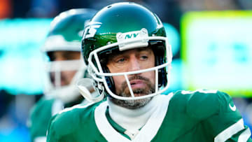 New York Jets quarterback Aaron Rodgers (8) limps off the field during a play where it appeared he had gotten injured, Sunday, December 22, 2024, in East Rutherford. Rodgers was back on the field during Gang GreenÕs next possession.