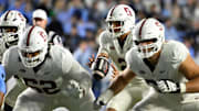 Nov 8, 2025; Chapel Hill, North Carolina, USA;  Stanford Cardinal quarterback Elijah Brown (2) takes the snap in the second quarter at Kenan Stadium. Mandatory Credit: Bob Donnan-Imagn Images