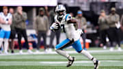 Nov 16, 2025; Atlanta, Georgia, USA; Carolina Panthers wide receiver Xavier Legette (17) runs with the ball in the second half against the Atlanta Falcons at Mercedes-Benz Stadium. Mandatory Credit: Dale Zanine-Imagn Images