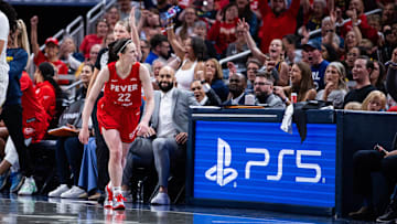 Indiana Fever guard Caitlin Clark celebrates a made basket in the second half against the Chicago Sky at Gainbridge Fieldhouse. 