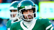 New York Jets quarterback Aaron Rodgers (8) limps off the field during a play where it appeared he had gotten injured, Sunday, December 22, 2024, in East Rutherford. Rodgers was back on the field during Gang GreenÕs next possession.