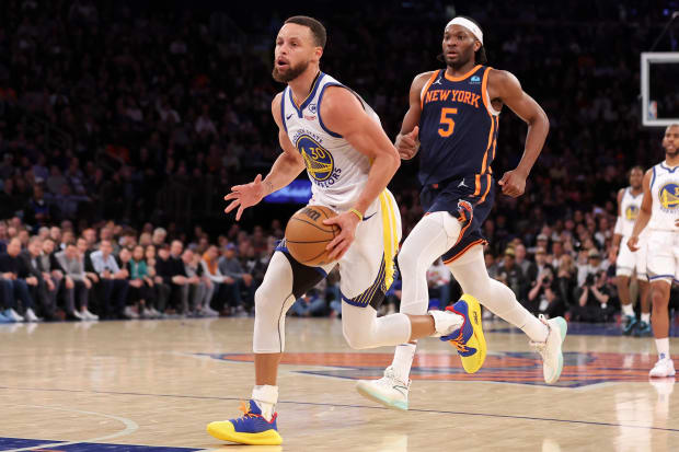 Feb 29, 2024; New York, New York, USA; Golden State Warriors guard Stephen Curry (30) drives to the basket against New York Knicks forward Precious Achiuwa (5) during the third quarter at Madison Square Garden. Mandatory Credit: Brad Penner-USA TODAY Sports