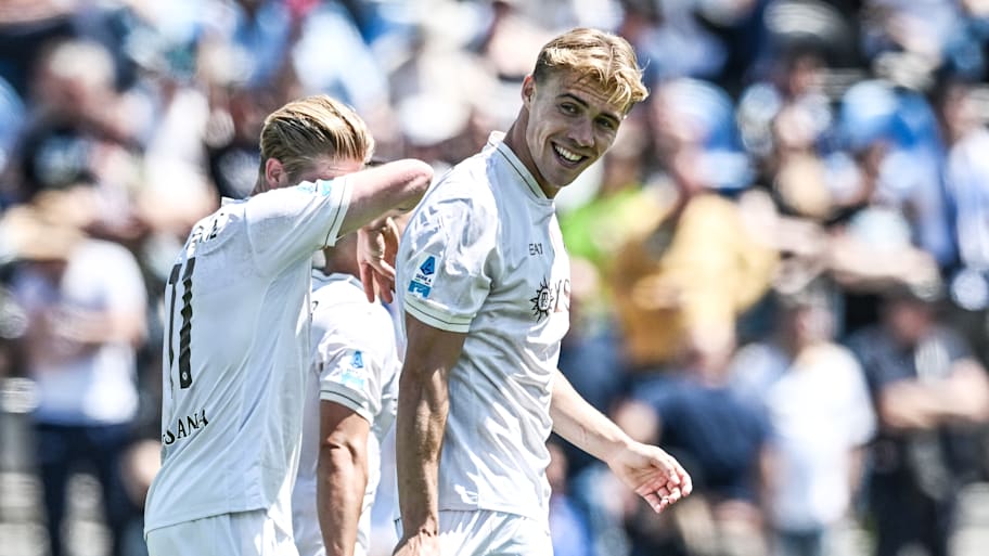 Rasmus Højlund grinning away.