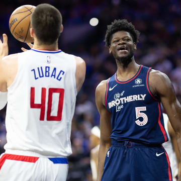 Mar 27, 2024; Philadelphia, Pennsylvania, USA; Philadelphia 76ers center Mo Bamba (5) reacts in front of LA Clippers center Ivica Zubac (40) after scoring during the first quarter at Wells Fargo Center. Mandatory Credit: Bill Streicher-USA TODAY Sports