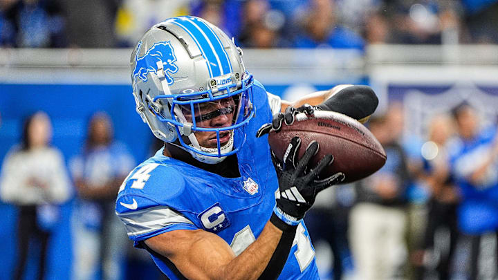 Detroit Lions wide receiver Amon-Ra St. Brown (14) warms up at Ford Field in Detroit on Sunday, September 8, 2024.