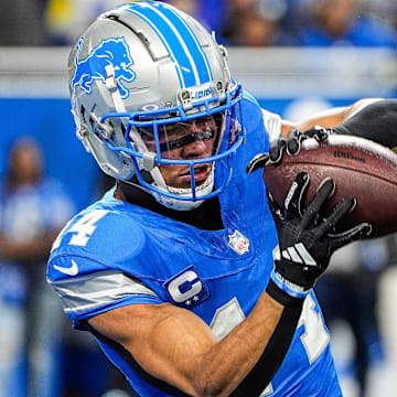 Detroit Lions wide receiver Amon-Ra St. Brown (14) warms up at Ford Field in Detroit on Sunday, September 8, 2024.