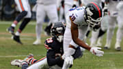 Nov 9, 2025; Chicago, Illinois, USA; New York Giants wide receiver Darius Slayton (18) makes a catch against Chicago Bears cornerback Tyrique Stevenson (29) during the second half at Soldier Field. Mandatory Credit: Mike Dinovo-Imagn Images