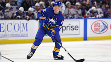 Feb 22, 2025; Buffalo, New York, USA;  Buffalo Sabres defenseman Rasmus Dahlin (26) looks to make a pass during the second period against the New York Rangers at KeyBank Center. Mandatory Credit: Timothy T. Ludwig-Imagn Images