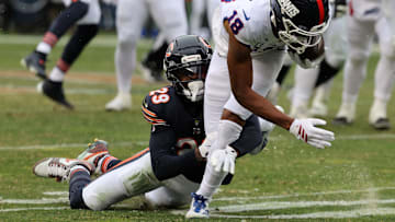 Nov 9, 2025; Chicago, Illinois, USA; New York Giants wide receiver Darius Slayton (18) makes a catch against Chicago Bears cornerback Tyrique Stevenson (29) during the second half at Soldier Field.