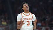 Texas Longhorns guard Dailyn Swain reacts during the first half against the Virginia Cavaliers at Moody Center.