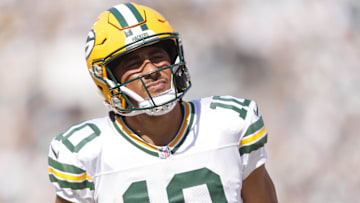 Green Bay Packers quarterback Jordan Love (10) reacts after an injury against the Jacksonville Jaguars during the second quarter at EverBank Stadium.
