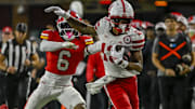 Nebraska Cornhuskers wide receiver Nyziah Hunter runs for a first down as Maryland Terrapins defensive back Dontay Joyner defends during the second half at SECU Stadium.