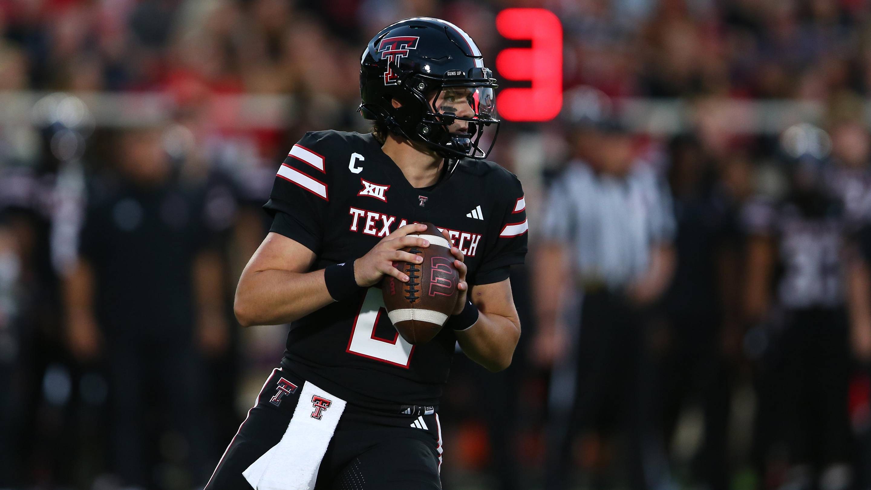 Sep 28, 2024; Lubbock, Texas, USA; Texas Tech Red Raiders quarterback Behren Morton (2) passes against the Cincinnati Bearcats in the first half at Jones AT&T Stadium and Cody Campbell Field. Mandatory Credit: Michael C. Johnson-Imagn Images