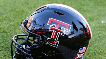 Nov 30, 2024; Lubbock, Texas, USA;  A general view of a Texas Tech Red Raiders helmet on the field before the game between the West Virginia Mountaineers and the Texas Tech Red Raiders at Jones AT&T Stadium and Cody Campbell Field. Mandatory Credit: Michael C. Johnson-Imagn Images