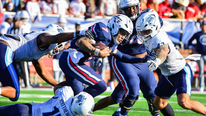 Nov 11, 2023; Lynchburg, Virginia, USA;  Liberty Flames quarterback Kaidon Salter (7) is tackled by Old Dominion Monarchs linebacker Wayne Matthews III (15) and Old Dominion Monarchs linebacker Jason Henderson (42) at Williams Stadium. Mandatory Credit: Brian Bishop-USA TODAY Sports