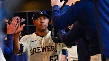 Apr 16, 2025; Milwaukee, Wisconsin, USA; Milwaukee Brewers starting pitcher Jose Quintana (62) is greeted in the dugout after pitching five plus innings against the Detroit Tigers at American Family Field. Mandatory Credit: Benny Sieu-Imagn Images