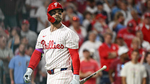 Bryce Harper of Philadelphia Phillies walks off field after strikeout
