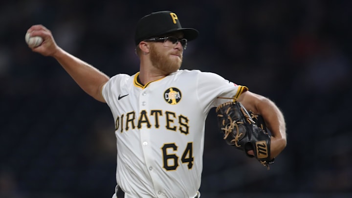 Aug 5, 2025; Pittsburgh, Pennsylvania, USA; Pittsburgh Pirates relief pitcher Cam Sanders (64) delivers a pitch in his major league debut against the San Francisco Giants during the eighth inning at PNC Park. Mandatory Credit: Charles LeClaire-Imagn Images Aug 5, 2025; Pittsburgh, Pennsylvania, USA; Pittsburgh Pirates relief pitcher Cam Sanders (64) delivers a pitch in his major league debut against the San Francisco Giants during the eighth inning at PNC Park. Mandatory Credit: Charles LeClaire-Imagn Images
