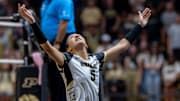 Purdue Junior Taylor Anderson (5) returns an a dig
