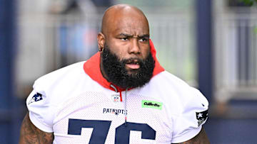 Jun 9, 2025; Foxborough, MA, USA; New England Patriots offensive tackle Morgan Moses (76) walks to the practice fields at Gillette Stadium. Mandatory Credit: Eric Canha-Imagn Images