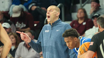 Jan 11, 2025; Starkville, Mississippi, USA; Kentucky Wildcats head coach Mark Pope reacts against the Mississippi State Bulldogs during the second half at Humphrey Coliseum. Mandatory Credit: Wesley Hale-Imagn Images