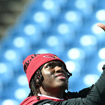 Sep 8, 2024; Orchard Park, New York, USA; Arizona Cardinals wide receiver Marvin Harrison Jr. warms up before a game against the Buffalo Bills at Highmark Stadium. Mandatory Credit: Mark Konezny-Imagn Images